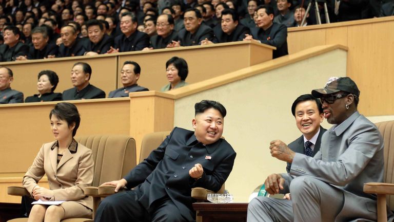 Kim Jong-Un watches a basketball game with Dennis Rodman in 2014