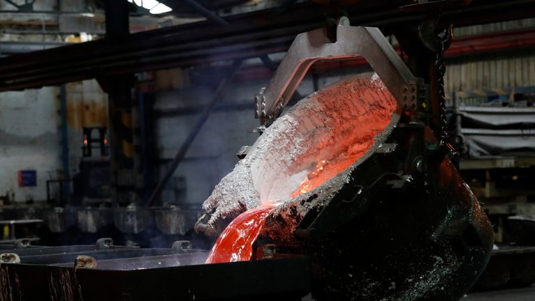 Molten aluminium is poured on the day of the completion of a 330 million pound deal to buy Britain's last remaining Aluminium smelter in Fort William Lochaber Scotland, Britain December 19, 2016.