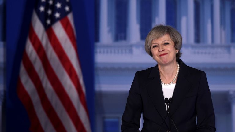 Theresa May acknowledges applause during her speech in Philadelphia
