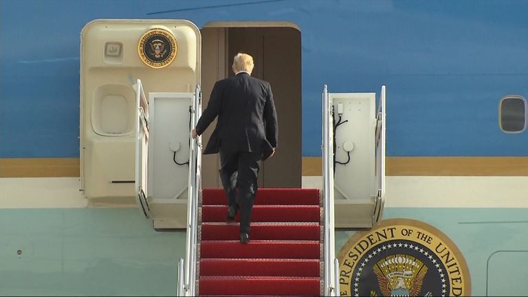 President Trump climbs on board Air Force One for the first time as Commander in Chief