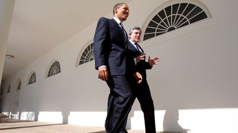 Barack Obama and Gordon Brown walk through the Colonnade at the White House in Washington, 2009