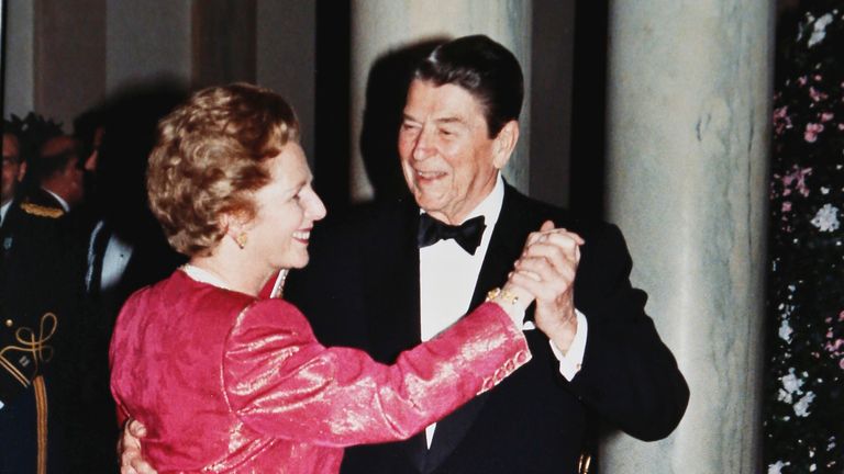 U.S. President Ronald Reagan and Britain's Prime Minister Margaret Thatcher dance in the foyer of the White House in 1988