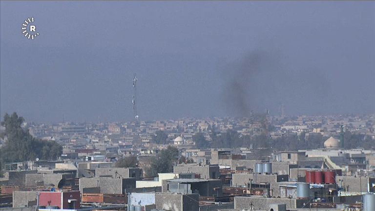 Smoke could be seen rising from Mosul as Iraqi forces entered the university