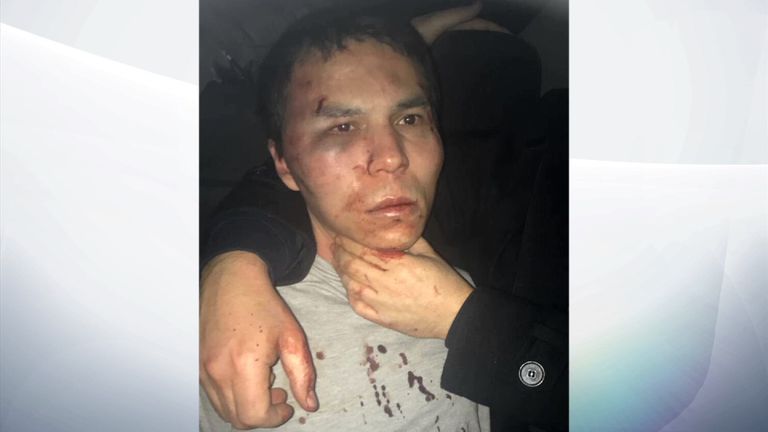 Masharipov was pictured bruised and bloodied after his arrest