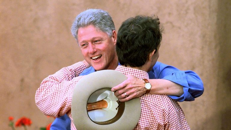 Bill Clinton hugs Tony Blair upon his arrival at the Denver Summit of the Eight. Blair obliged Clinton's request that all the leaders wear cowboy boots and casual wear to the dinner