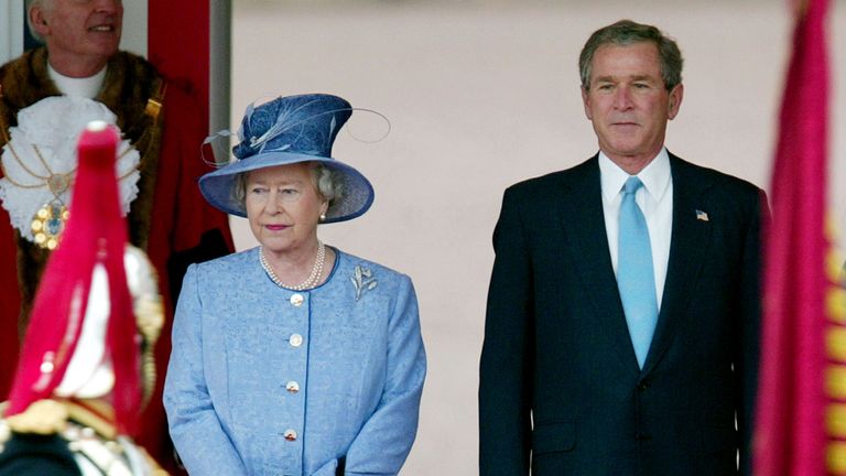 U.S. President George W. Bush stands with Queen Elizabeth at Buckingham Palace, November 19, 2003