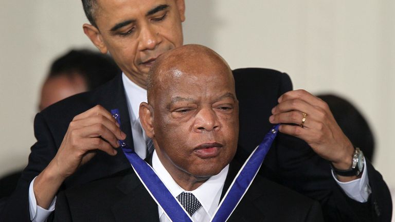 President Obama presents John Lewis with the Medal of Freedom, America&#39;s highest civilian honour, in 2010
