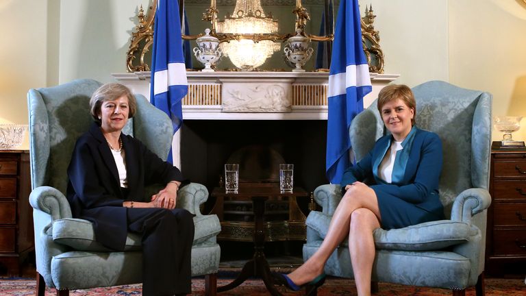 Nicola Sturgeon and Theresa May in July