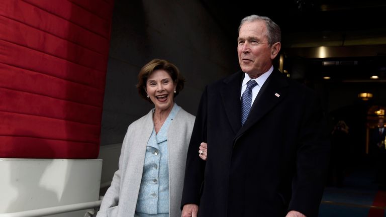 Former U.S. President George W. Bush and First Lady Laura Bush arrive