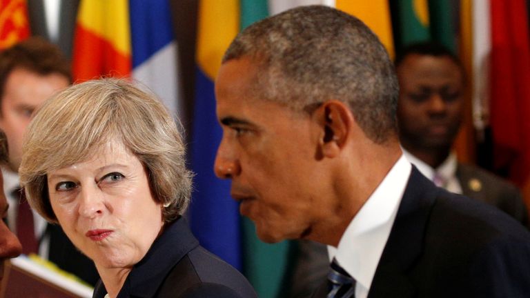 Theresa May looks over toward Barack Obama during the luncheon at the United Nations General Assembly in New York, 2016