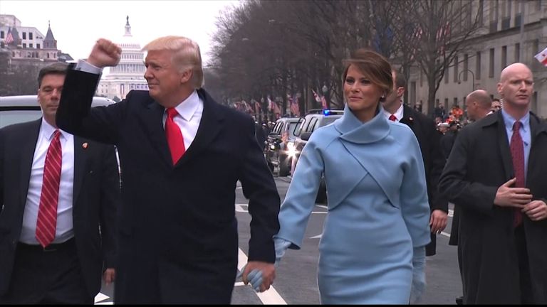 Donald Trump walks part of the way to the White House during inaugural parade
