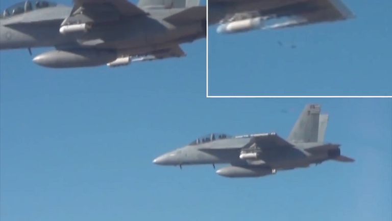 A couple of drones are released (top right). Pic: US Department of Defense