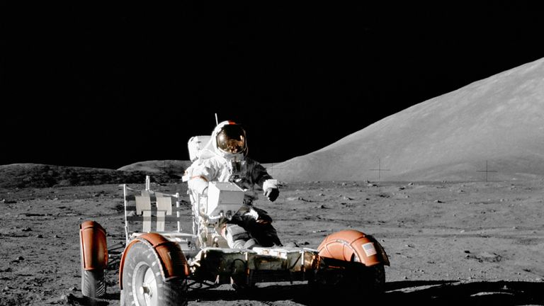 Cernan on board the lunar rover on the surface of the moon