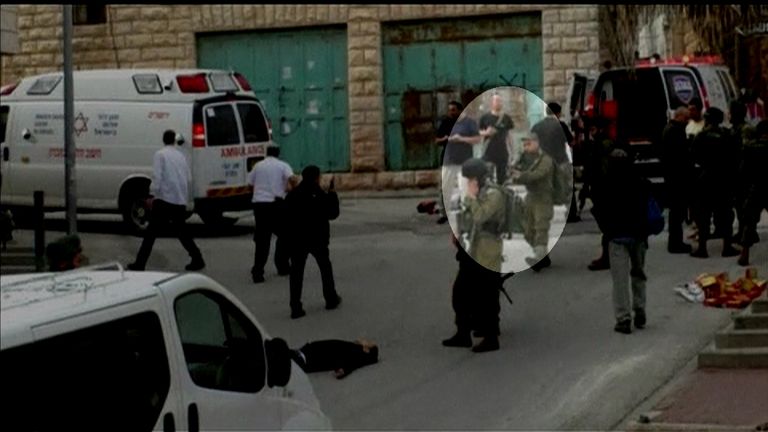 Elor Azaria (highlighted) shoots the incapacitated man in the head