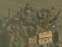 Iraqi forces taking part in the assault on Mosul airport