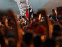 US President Donald Trump and First Lady Melania Trump arrive for a rally on February 18, 2017 in Melbourne, Florida