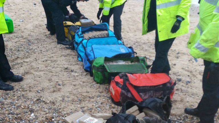 The holdalls were discovered on Hopton Beach, near Great Yarmouth