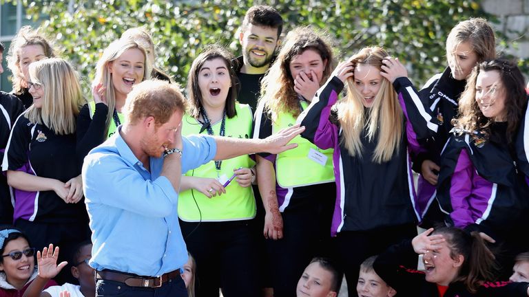 Prince Harry dabbing while visiting a school in Scotland last year