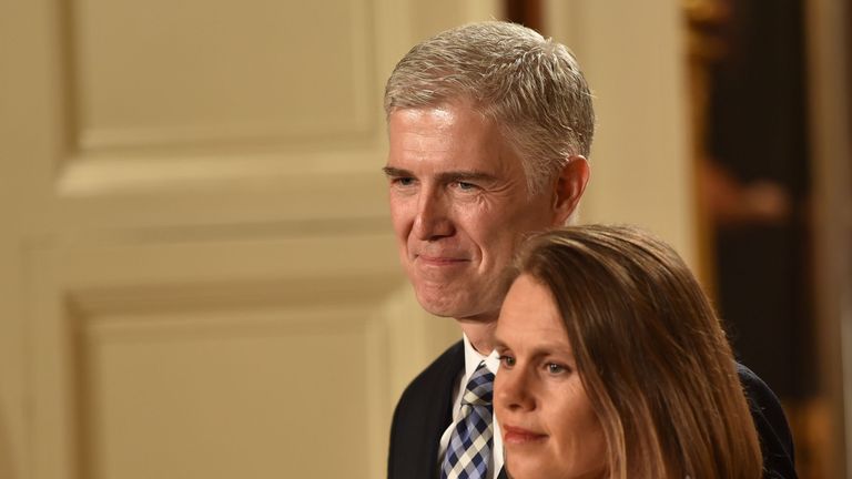 Judge Neil Gorsuch (L) and his wife Marie Louise look on, after US President Donald Trump nominated him for the Supreme Court, at the White House in Washington, DC, on January 31, 2017