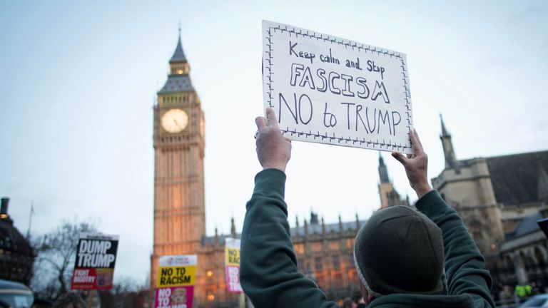 Protesters demonstrate outside Parliament where a debate on Trump&#39;s state visit is taking place