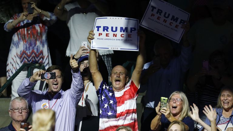 Supporters cheer for Republican Presidential nominee Donald Trump during a campaign rally at the Mississippi Coliseum on August 24, 2016 in Jackson, Mississippi