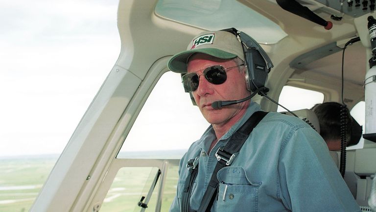 Actor Harrison Ford flies his helicopter July 10, 2001 near Jackson, Wy. Ford Located And Rescued Missing 13-Year-Old Boy Scout Cody Clawson. (Photo By Getty Images)