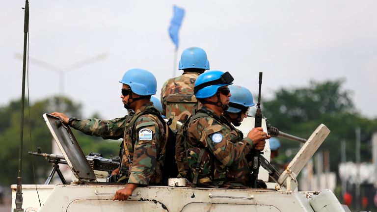 UN peacekeepers patrol the streets during demonstrations in Kinshasa