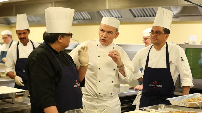 Head Chef Mark Flanagan (centre) and Chef Uday Salumkhe (left) in the kitchen at Buckingham Palace in London as they prepare food for a reception this evening to mark the launch of the UK-India Year of Culture 2017 being attend by Queen Elizabeth II.