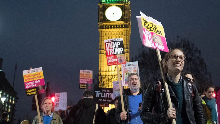 Demonstrators attend a rally in Westminster protesting against Donald Trump 