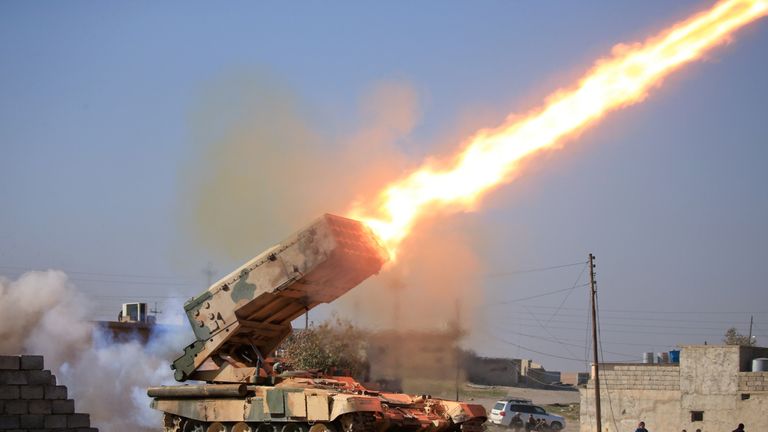 Iraqi army launch a rocket towards Islamic State militants near Ghozlani military complex, south of Mosul
