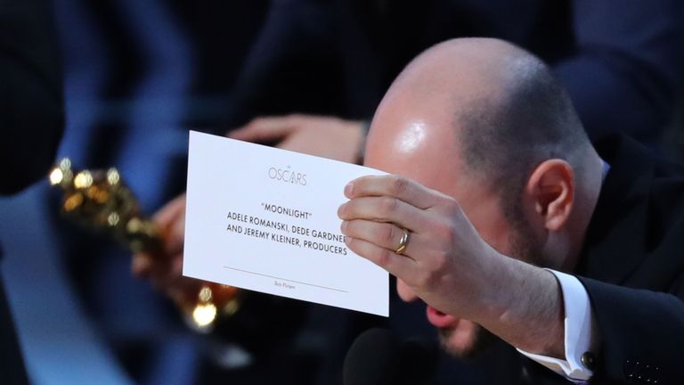 In case anyone was in doubt... the card for best picture winner is held up by Moonlight&#39;s producer