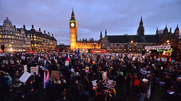 Demonstrators attend a rally in Westminster protesting against Donald Trump