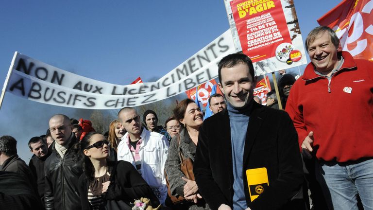 The Socialist nominee attends a workers&#39; protest for higher wages in Paris
