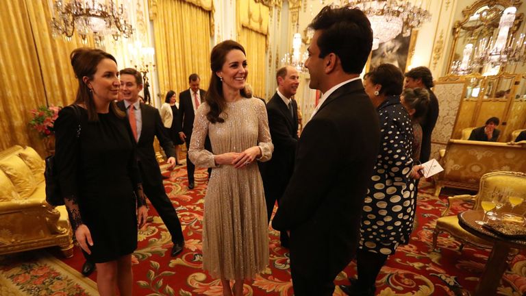 Duchess of Cambridge (centre) speaks to chef Vikas Khanna (right), who is one of the presenters of MasterChef India, at a reception to mark the launch of the UK-India Year of Culture 2017 at Buckingham Palace, London