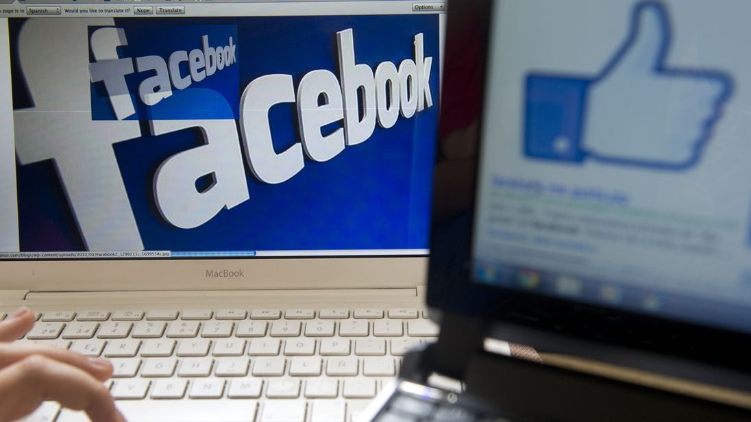 A boy surfs on the Facebook site in Medellin, Antioquia department, Colombia on May 12, 2012