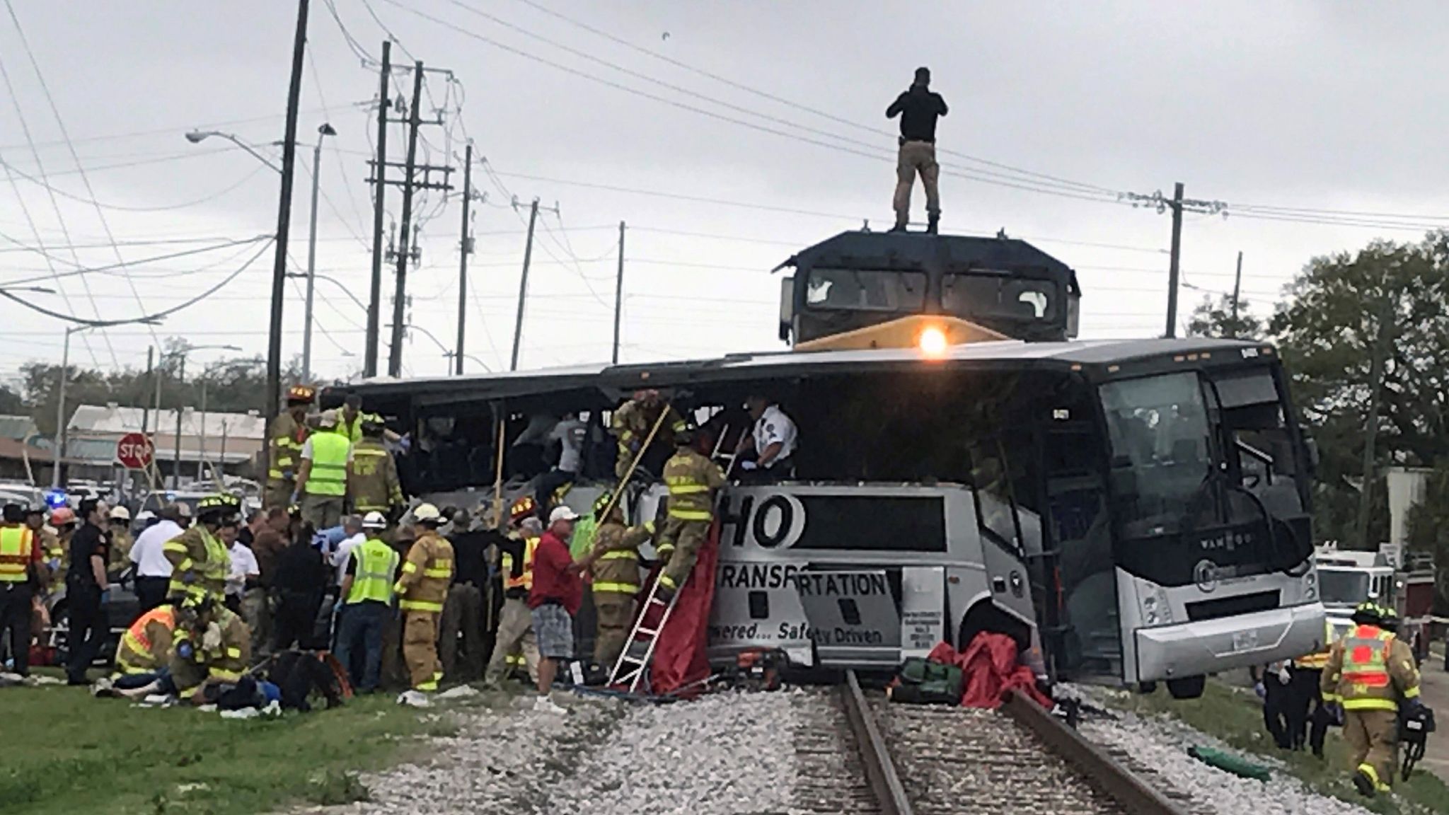 Dozens injured and four killed as train hits bus in Mississippi World