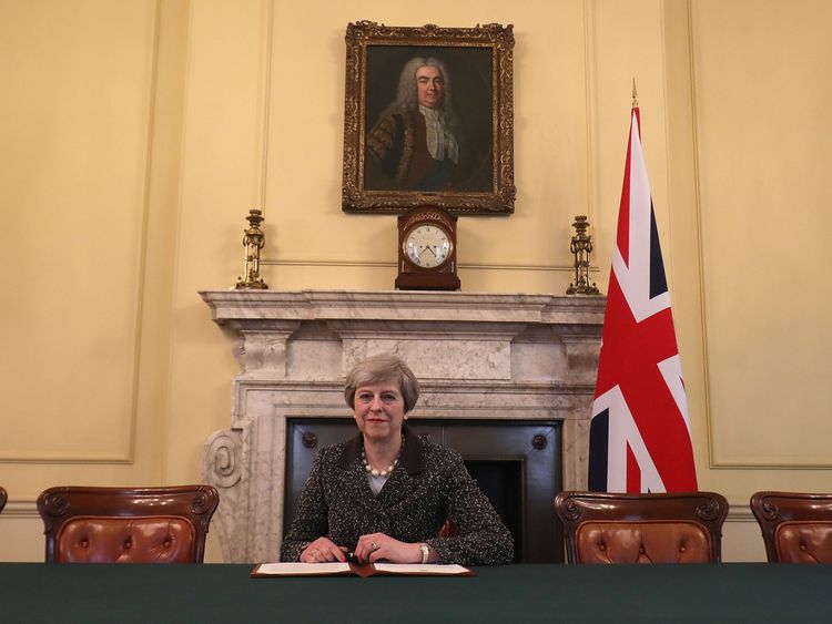 Embargoed to 2200 Tuesday March 28 Prime Minister Theresa May in the cabinet signs the Article 50 letter, as she prepares to trigger the start of the UK's formal withdrawal from the EU on Wednesday