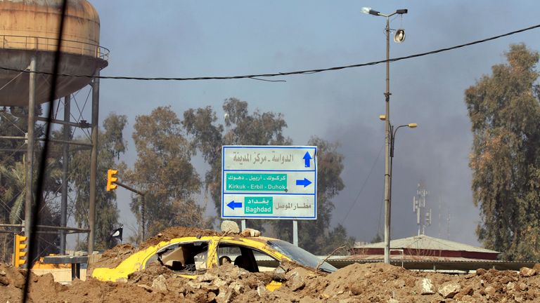 A city sign in Mosul as the battle with Islamic State continues