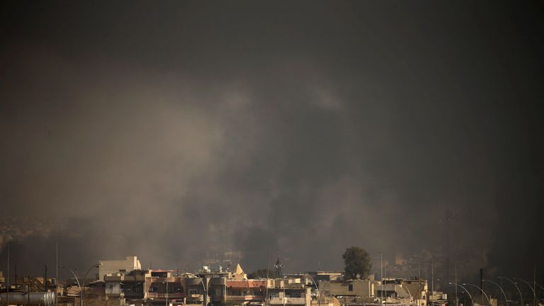 Smoke rises from clashes during a battle between Iraqi forces and Islamic State militants in Mosul