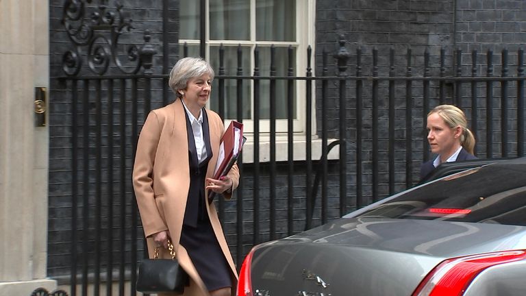 Theresa May leaves Downing Street