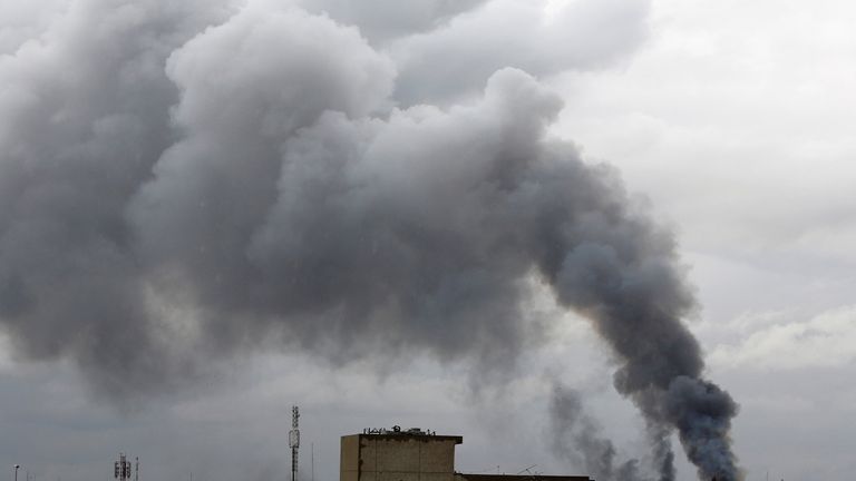 Smoke rises from clashes during a battle between Iraqi forces and Islamic State militants in the city of Mosul