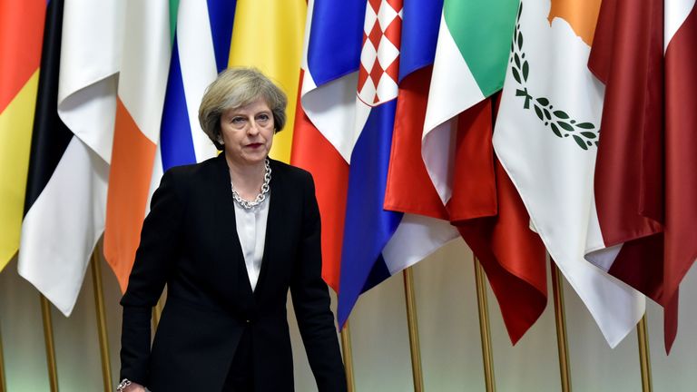 Theresa May leaves a EU Summit at the European Council headquarters in Brussels in 2016