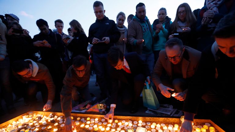 People light candles in Trafalgar Square for victims of the London attack