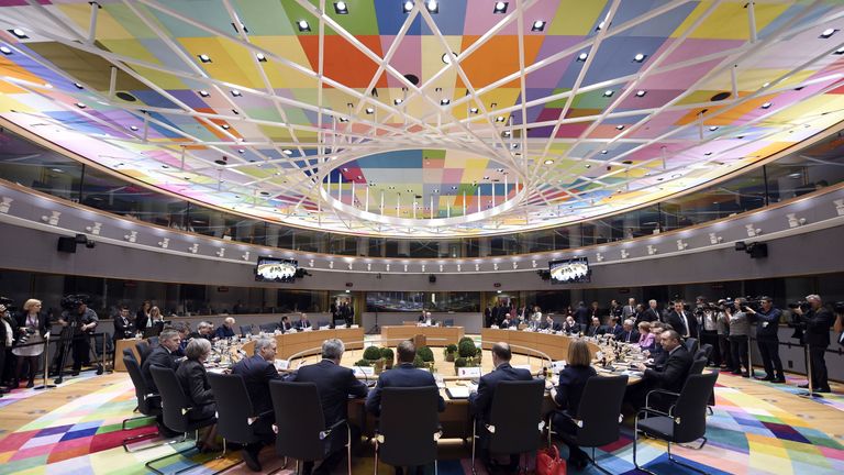 European leaders arrive for a meeting in the council room at the new Europa building