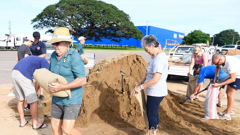 Townsville residents fill sandbags in preparation for Cyclone Debbie