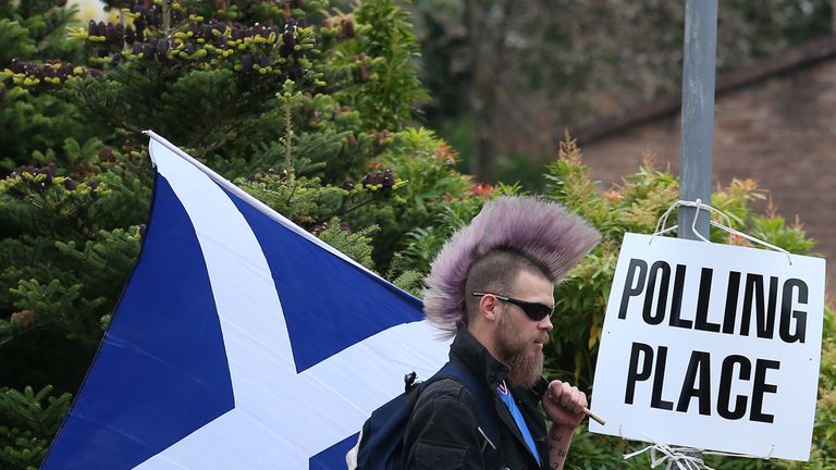 File photo dated 18/9/2014 of Chris McAleese walks by a polling sign at Bannockburn Polling Station, as voters go to the polls in the Scottish Referendum. The Scottish First Minister Nicola Sturgeon said a new independence referendum should be held between autumn 2018 and spring 2019.