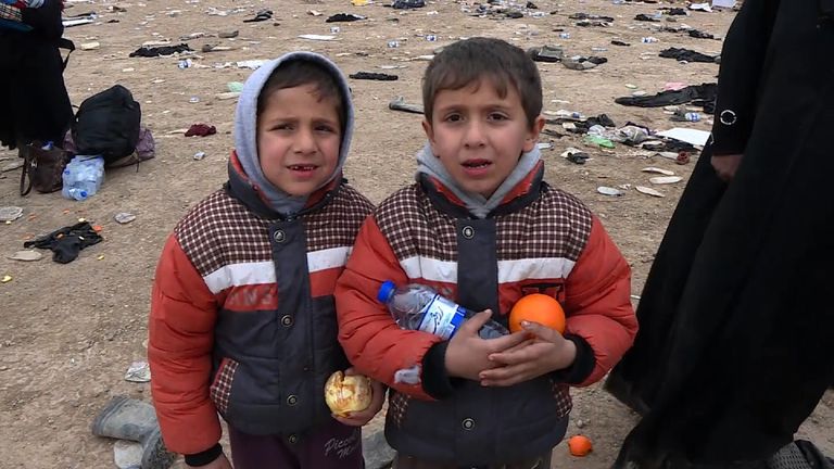 Two boys who have fled from their homes in Mosul, Iraq