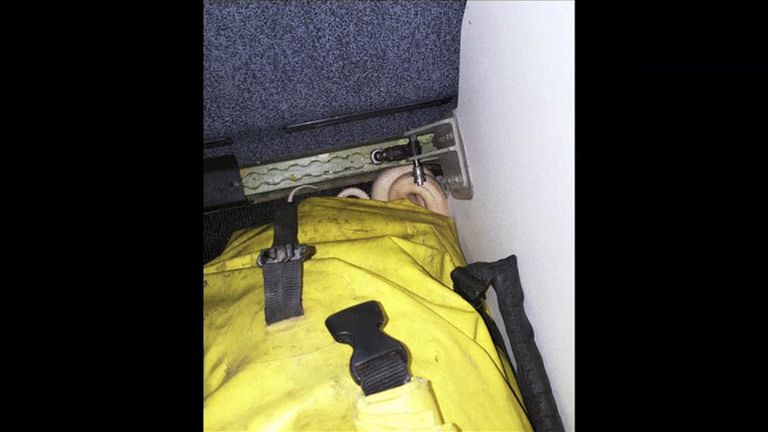The snake was spotted hidden behind a duffel bag. Pic: Anna McConnaughy