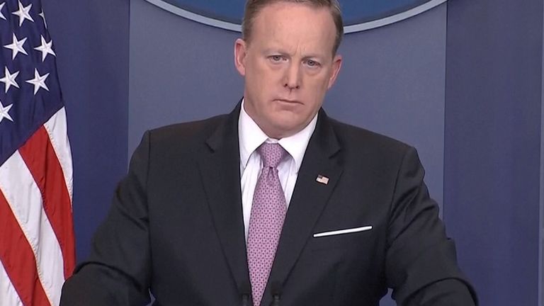 Once alerted to his error, Mr Spicer quickly turned his pin the right way up