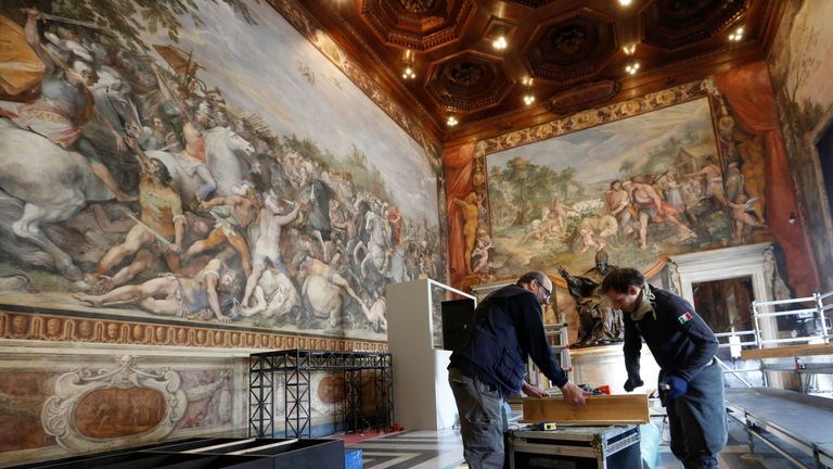 Workers prepare the Orazi and Curiazi hall for the meeting of EU leaders on the 60th anniversary of the Treaty of Rome, in Rome, Italy March 24, 2017. REUTERS/Remo Casilli